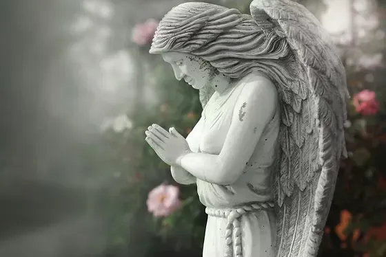 angel-pray-statue.webp